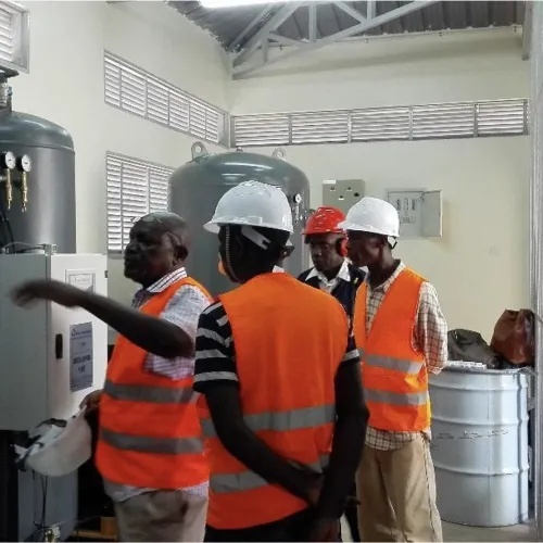 Medical oxygen plant operators and engineers at China Uganda Friendship hospital undergoing technical training on how to operate the medical oxygen plant.